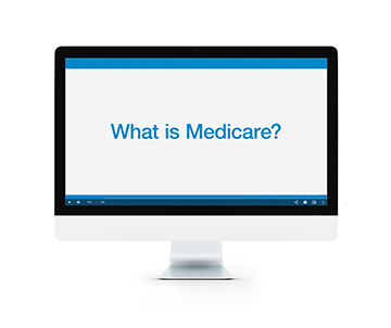 A computer screen that reads "What is Medicare?" 