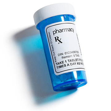 A blue bottle of prescription medicine