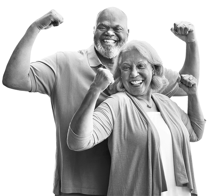 Senior couple flexing their muscles